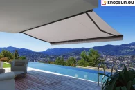 Dakar awning mounted to the ceiling over the terrace and swimming pool