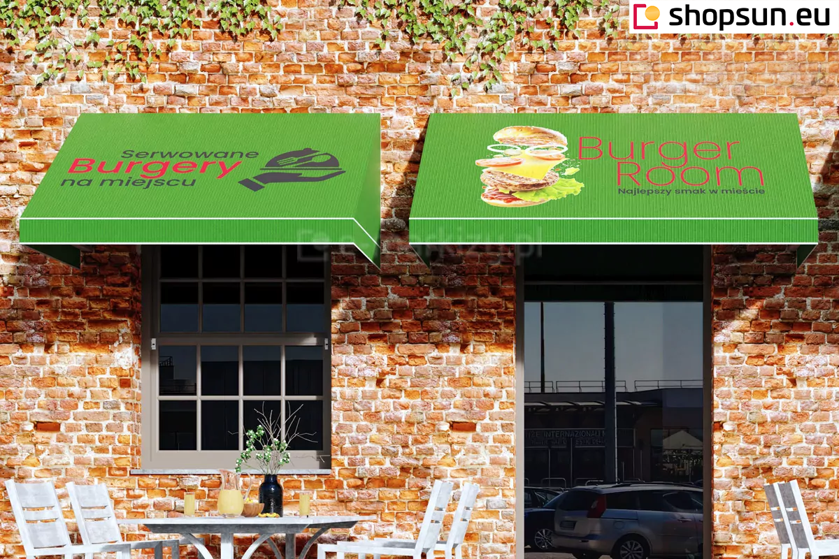 A triangular awning with a printed burger advertisement with the restaurant's logo and slogan