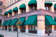 Triangular basket awning with a wavy valance and an aesthetic border in the color of the structure