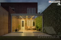 Illuminated terrace enclosed by sliding glass doors, providing protection from the weather without obstructing the views