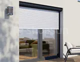 Surface-mounted external facade roller blinds